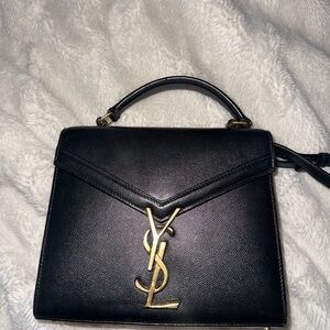 Yves Saint Laurent Black Cassandra Mini Grained Top Handle Bag
